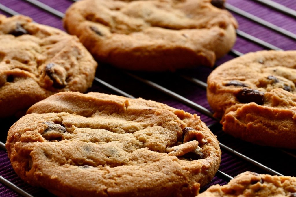 chocolate chip cookies cooling on a baking rack