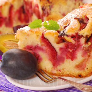 Slice of Plum Cake on a dessert plate.