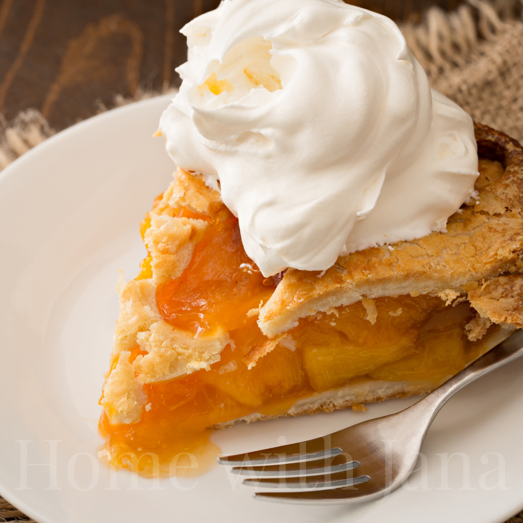Slice of peach pie with flaky crust
