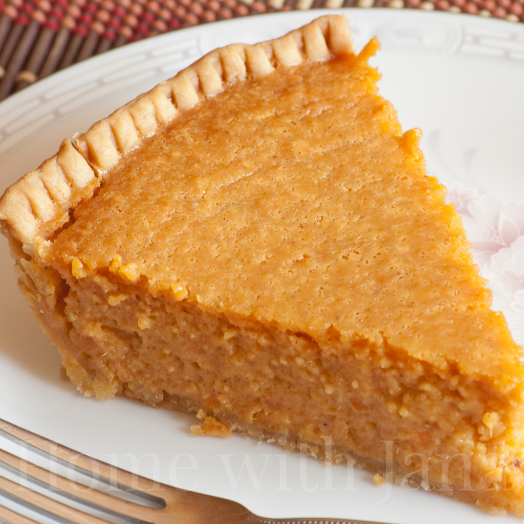 Homemade Sweet Potato Pie on a white plate