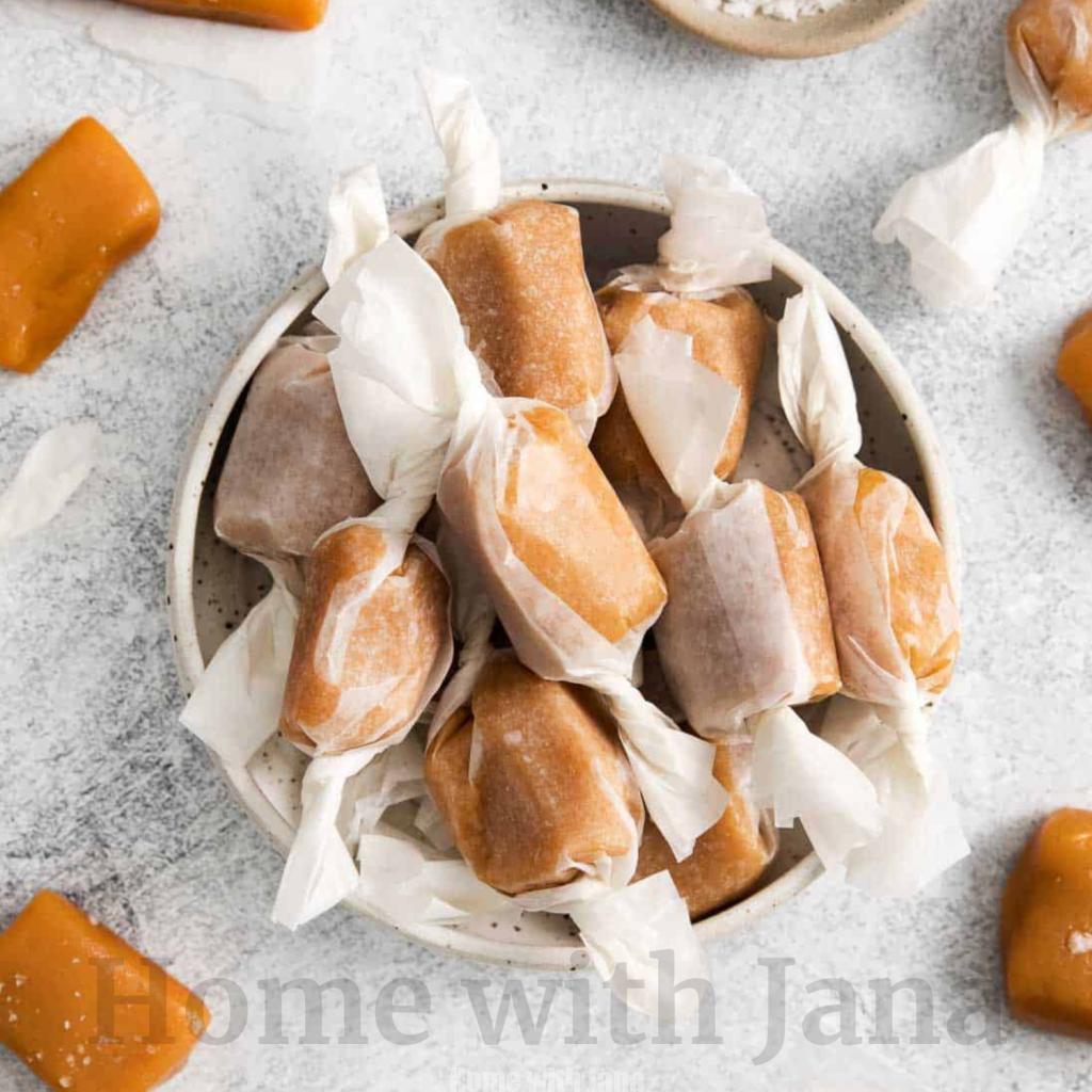 Old-fashioned butter taffy wrapped in wax paper with soft caramel-like texture